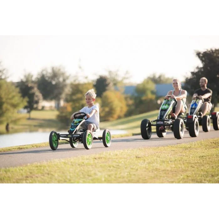family on pedal racers