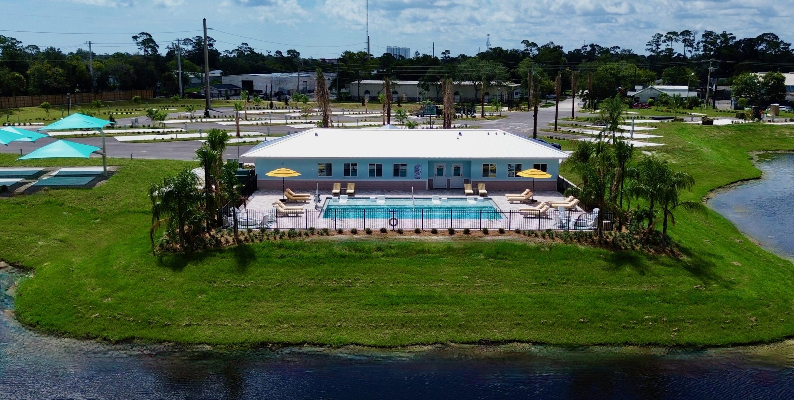 clubhouse view from air over lake